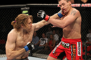 SYDNEY, AUSTRALIA - MARCH 03:  (L-R) Andrew Craig punches Kyle Noke during a middleweight bout during the UFC on FX event at Allphones Arena on March 3, 2012 in Sydney, Australia.  (Photo by Josh Hedges/Zuffa LLC/Zuffa LLC via Getty Images) *** Local Caption *** Kyle Noke; Andrew Craig