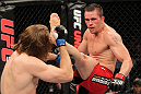 SYDNEY, AUSTRALIA - MARCH 03:  (R-L) Kyle Noke kicks Andrew Craig in their middleweight bout during the UFC on FX event at Allphones Arena on March 3, 2012 in Sydney, Australia.  (Photo by Josh Hedges/Zuffa LLC/Zuffa LLC via Getty Images) *** Local Caption *** Kyle Noke; Andrew Craig