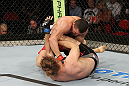 SYDNEY, AUSTRALIA - MARCH 03:  (R-L) Kyle Noke punches Andrew Craig in their middleweight bout during the UFC on FX event at Allphones Arena on March 3, 2012 in Sydney, Australia.  (Photo by Josh Hedges/Zuffa LLC/Zuffa LLC via Getty Images) *** Local Caption *** Kyle Noke; Andrew Craig