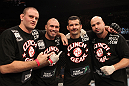 SYDNEY, AUSTRALIA - MARCH 03:  Anthony Perosh (second from right) poses for a photo with his trainers after defeating Nick Penner in a light heavyweight bout during the UFC on FX event at Allphones Arena on March 3, 2012 in Sydney, Australia.  (Photo by Josh Hedges/Zuffa LLC/Zuffa LLC via Getty Images) *** Local Caption *** Anthony Perosh; Elvis Sinosic