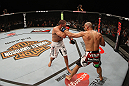 SYDNEY, AUSTRALIA - MARCH 03:  (R-L) Constantinos Philippou punches Court McGee in a middleweight bout during the UFC on FX event at Allphones Arena on March 3, 2012 in Sydney, Australia.  (Photo by Josh Hedges/Zuffa LLC/Zuffa LLC via Getty Images) *** Local Caption *** Court McGee; Constantinos Philippou