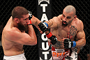 SYDNEY, AUSTRALIA - MARCH 03:  (R-L) Constantinos Philippou punches Court McGee in a middleweight bout during the UFC on FX event at Allphones Arena on March 3, 2012 in Sydney, Australia.  (Photo by Josh Hedges/Zuffa LLC/Zuffa LLC via Getty Images) *** Local Caption *** Court McGee; Constantinos Philippou