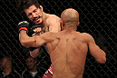SYDNEY, AUSTRALIA - MARCH 03:  (R-L) Demetrious Johnson punches Ian McCall in a flyweight bout during the UFC on FX event at Allphones Arena on March 3, 2012 in Sydney, Australia.  (Photo by Josh Hedges/Zuffa LLC/Zuffa LLC via Getty Images) *** Local Caption *** Demetrious Johnson; Ian McCall