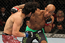 SYDNEY, AUSTRALIA - MARCH 03:  (R-L) Demetrious Johnson punches Ian McCall in a flyweight bout during the UFC on FX event at Allphones Arena on March 3, 2012 in Sydney, Australia.  (Photo by Josh Hedges/Zuffa LLC/Zuffa LLC via Getty Images) *** Local Caption *** Demetrious Johnson; Ian McCall