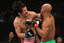 SYDNEY, AUSTRALIA - MARCH 03:  (R-L) Demetrious Johnson punches Ian McCall in a flyweight bout during the UFC on FX event at Allphones Arena on March 3, 2012 in Sydney, Australia.  (Photo by Josh Hedges/Zuffa LLC/Zuffa LLC via Getty Images) *** Local Caption *** Demetrious Johnson; Ian McCall