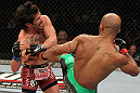 SYDNEY, AUSTRALIA - MARCH 03:  (R-L) Demetrious Johnson kicks Ian McCall in a flyweight bout during the UFC on FX event at Allphones Arena on March 3, 2012 in Sydney, Australia.  (Photo by Josh Hedges/Zuffa LLC/Zuffa LLC via Getty Images) *** Local Caption *** Demetrious Johnson; Ian McCall