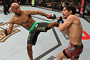 SYDNEY, AUSTRALIA - MARCH 03:  (L-R) Demetrious Johnson kicks Ian McCall in a flyweight bout during the UFC on FX event at Allphones Arena on March 3, 2012 in Sydney, Australia.  (Photo by Josh Hedges/Zuffa LLC/Zuffa LLC via Getty Images) *** Local Caption *** Demetrious Johnson; Ian McCall