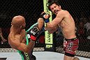 SYDNEY, AUSTRALIA - MARCH 03:  (L-R) Demetrious Johnson kicks Ian McCall in a flyweight bout during the UFC on FX event at Allphones Arena on March 3, 2012 in Sydney, Australia.  (Photo by Josh Hedges/Zuffa LLC/Zuffa LLC via Getty Images) *** Local Caption *** Demetrious Johnson; Ian McCall