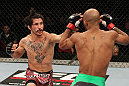SYDNEY, AUSTRALIA - MARCH 03:  (L-R) Ian McCall punches Demetrious Johnson in a flyweight bout during the UFC on FX event at Allphones Arena on March 3, 2012 in Sydney, Australia.  (Photo by Josh Hedges/Zuffa LLC/Zuffa LLC via Getty Images) *** Local Caption *** Demetrious Johnson; Ian McCall