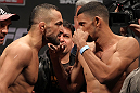 STOCKHOLM, SWEDEN - APRIL 13:  (L-R) Lightweight opponents Reza Madadi and Yoislandy Izquierdo face off after weighing during the official UFC on Fuel TV weigh in event at Ericsson Globe on April 13, 2012 in Stockholm, Sweden.  (Photo by Josh Hedges/Zuffa LLC/Zuffa LLC via Getty Images)