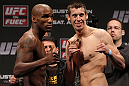 STOCKHOLM, SWEDEN - APRIL 13:  (L-R) Middleweight opponents Francis Carmont and Magnus Cedenblad face off after weighing in during the official UFC on Fuel TV weigh in event at Ericsson Globe on April 13, 2012 in Stockholm, Sweden.  (Photo by Josh Hedges/Zuffa LLC/Zuffa LLC via Getty Images)