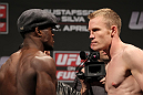 STOCKHOLM, SWEDEN - APRIL 13:  (L-R) Welterweight opponents Papy Abedi and James Head face off after weighing in during the official UFC on Fuel TV weigh in event at Ericsson Globe on April 13, 2012 in Stockholm, Sweden.  (Photo by Josh Hedges/Zuffa LLC/Zuffa LLC via Getty Images)