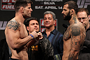 STOCKHOLM, SWEDEN - APRIL 13:  (L-R) Middleweight opponents Brian Stann and Alessio Sakara face off after weighing in during the official UFC on Fuel TV weigh in event at Ericsson Globe on April 13, 2012 in Stockholm, Sweden.  (Photo by Josh Hedges/Zuffa LLC/Zuffa LLC via Getty Images)