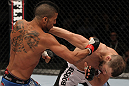 STOCKHOLM, SWEDEN - APRIL 14:  (L-R) Jason Young punches Eric Wisely during their featherweight bout at the UFC on Fuel TV event at Ericsson Globe on April 14, 2012 in Stockholm, Sweden.  (Photo by Josh Hedges/Zuffa LLC/Zuffa LLC via Getty Images)