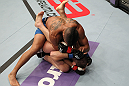 STOCKHOLM, SWEDEN - APRIL 14:  (L-R) Jason Young punches Eric Wisely during their featherweight bout at the UFC on Fuel TV event at Ericsson Globe on April 14, 2012 in Stockholm, Sweden.  (Photo by Josh Hedges/Zuffa LLC/Zuffa LLC via Getty Images)