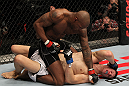 STOCKHOLM, SWEDEN - APRIL 14:  (L-R) Francis Carmont punches Magnus Cedenblad during their middleweight bout at the UFC on Fuel TV event at Ericsson Globe on April 14, 2012 in Stockholm, Sweden.  (Photo by Josh Hedges/Zuffa LLC/Zuffa LLC via Getty Images)