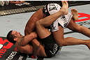 STOCKHOLM, SWEDEN - APRIL 14:  (L-R) Tom DeBlass attempts a guillotine choke submission against Cyrille Diabate during their light heavyweight bout at the UFC on Fuel TV event at Ericsson Globe on April 14, 2012 in Stockholm, Sweden.  (Photo by Josh Hedges/Zuffa LLC/Zuffa LLC via Getty Images)