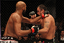 STOCKHOLM, SWEDEN - APRIL 14:  (L-R) Cyrille Diabate punches Tom DeBlass during their light heavyweight bout at the UFC on Fuel TV event at Ericsson Globe on April 14, 2012 in Stockholm, Sweden.  (Photo by Josh Hedges/Zuffa LLC/Zuffa LLC via Getty Images)