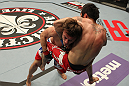STOCKHOLM, SWEDEN - APRIL 14:  (L-R) Brad Pickett takes down Damacio Page during their bantamweight bout at the UFC on Fuel TV event at Ericsson Globe on April 14, 2012 in Stockholm, Sweden.  (Photo by Josh Hedges/Zuffa LLC/Zuffa LLC via Getty Images)