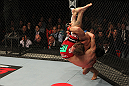 STOCKHOLM, SWEDEN - APRIL 14:  (R-L) Brad Pickett takes down Damacio Page during their bantamweight bout at the UFC on Fuel TV event at Ericsson Globe on April 14, 2012 in Stockholm, Sweden.  (Photo by Josh Hedges/Zuffa LLC/Zuffa LLC via Getty Images)