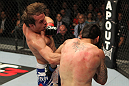 STOCKHOLM, SWEDEN - APRIL 14:  (L-R) Brad Pickett punches Damacio Page during their bantamweight bout at the UFC on Fuel TV event at Ericsson Globe on April 14, 2012 in Stockholm, Sweden.  (Photo by Josh Hedges/Zuffa LLC/Zuffa LLC via Getty Images)
