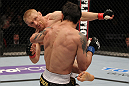 STOCKHOLM, SWEDEN - APRIL 14:  (L-R) Dennis Siver kicks Diego Nunes during their featherweight bout at the UFC on Fuel TV event at Ericsson Globe on April 14, 2012 in Stockholm, Sweden.  (Photo by Josh Hedges/Zuffa LLC/Zuffa LLC via Getty Images)