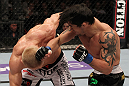 STOCKHOLM, SWEDEN - APRIL 14:  (R-L) Diego Nunes punches Dennis Siver during their featherweight bout at the UFC on Fuel TV event at Ericsson Globe on April 14, 2012 in Stockholm, Sweden.  (Photo by Josh Hedges/Zuffa LLC/Zuffa LLC via Getty Images)