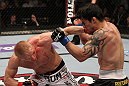 STOCKHOLM, SWEDEN - APRIL 14:  (L-R) Dennis Siver punches Diego Nunes during their featherweight bout at the UFC on Fuel TV event at Ericsson Globe on April 14, 2012 in Stockholm, Sweden.  (Photo by Josh Hedges/Zuffa LLC/Zuffa LLC via Getty Images)