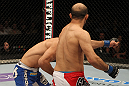 STOCKHOLM, SWEDEN - APRIL 14:  (R-L) Siyar Bahadurzada knocks out Paulo Thiago with a punch during their welterweight bout at the UFC on Fuel TV event at Ericsson Globe on April 14, 2012 in Stockholm, Sweden.  (Photo by Josh Hedges/Zuffa LLC/Zuffa LLC via Getty Images)