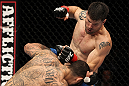 STOCKHOLM, SWEDEN - APRIL 14:  (R-L) Brian Stann punches Alessio Sakara during their middleweight bout at the UFC on Fuel TV event at Ericsson Globe on April 14, 2012 in Stockholm, Sweden.  (Photo by Josh Hedges/Zuffa LLC/Zuffa LLC via Getty Images)