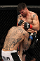 STOCKHOLM, SWEDEN - APRIL 14:  (R-L) Brian Stann delivers a knee strike against Alessio Sakara during their middleweight bout at the UFC on Fuel TV event at Ericsson Globe on April 14, 2012 in Stockholm, Sweden.  (Photo by Josh Hedges/Zuffa LLC/Zuffa LLC via Getty Images)