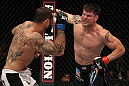 STOCKHOLM, SWEDEN - APRIL 14:  (R-L) Brian Stann punches Alessio Sakara during their middleweight bout at the UFC on Fuel TV event at Ericsson Globe on April 14, 2012 in Stockholm, Sweden.  (Photo by Josh Hedges/Zuffa LLC/Zuffa LLC via Getty Images)