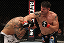 STOCKHOLM, SWEDEN - APRIL 14:  (R-L) Brian Stann punches Alessio Sakara during their middleweight bout at the UFC on Fuel TV event at Ericsson Globe on April 14, 2012 in Stockholm, Sweden.  (Photo by Josh Hedges/Zuffa LLC/Zuffa LLC via Getty Images)