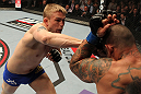 STOCKHOLM, SWEDEN - APRIL 14:  (L-R) Alexander Gustafsson punches Thiago Silva during their light heavyweight bout at the UFC on Fuel TV event at Ericsson Globe on April 14, 2012 in Stockholm, Sweden.  (Photo by Josh Hedges/Zuffa LLC/Zuffa LLC via Getty Images)