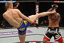 STOCKHOLM, SWEDEN - APRIL 14:  (L-R) Alexander Gustafsson kicks Thiago Silva during their light heavyweight bout at the UFC on Fuel TV event at Ericsson Globe on April 14, 2012 in Stockholm, Sweden.  (Photo by Josh Hedges/Zuffa LLC/Zuffa LLC via Getty Images)