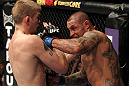 STOCKHOLM, SWEDEN - APRIL 14:  (R-L) Thiago Silva punches Alexander Gustafsson during their light heavyweight bout at the UFC on Fuel TV event at Ericsson Globe on April 14, 2012 in Stockholm, Sweden.  (Photo by Josh Hedges/Zuffa LLC/Zuffa LLC via Getty Images)