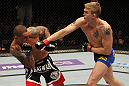 STOCKHOLM, SWEDEN - APRIL 14:  (R-L) Alexander Gustafsson punches Thiago Silva during their light heavyweight bout at the UFC on Fuel TV event at Ericsson Globe on April 14, 2012 in Stockholm, Sweden.  (Photo by Josh Hedges/Zuffa LLC/Zuffa LLC via Getty Images)