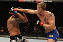 STOCKHOLM, SWEDEN - APRIL 14:  (R-L) Alexander Gustafsson punches Thiago Silva during their light heavyweight bout at the UFC on Fuel TV event at Ericsson Globe on April 14, 2012 in Stockholm, Sweden.  (Photo by Josh Hedges/Zuffa LLC/Zuffa LLC via Getty Images)
