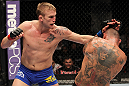 STOCKHOLM, SWEDEN - APRIL 14:  (L-R) Alexander Gustafsson punches Thiago Silva during their light heavyweight bout at the UFC on Fuel TV event at Ericsson Globe on April 14, 2012 in Stockholm, Sweden.  (Photo by Josh Hedges/Zuffa LLC/Zuffa LLC via Getty Images)