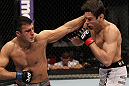 STOCKHOLM, SWEDEN - APRIL 14:  (L-R) Besam Yousef punches Simeon Thoresen during their welterweight bout at the UFC on Fuel TV event at Ericsson Globe on April 14, 2012 in Stockholm, Sweden.  (Photo by Josh Hedges/Zuffa LLC/Zuffa LLC via Getty Images)