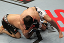 STOCKHOLM, SWEDEN - APRIL 14:  (R-L) Simeon Thoresen attempts to secure a rear choke submission against Besam Yousef during their welterweight bout at the UFC on Fuel TV event at Ericsson Globe on April 14, 2012 in Stockholm, Sweden.  (Photo by Josh Hedges/Zuffa LLC/Zuffa LLC via Getty Images)