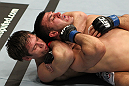 STOCKHOLM, SWEDEN - APRIL 14:  (L-R) Simeon Thoresen secures a rear choke submission against Besam Yousef during their welterweight bout at the UFC on Fuel TV event at Ericsson Globe on April 14, 2012 in Stockholm, Sweden.  (Photo by Josh Hedges/Zuffa LLC/Zuffa LLC via Getty Images)