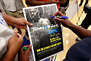 ATLANTA, GA - APRIL 19:  Rashad Evans signs autographs after working out for the media during UFC 145 open workouts at GSU Sports Arena on April 19, 2012 in Atlanta, Georgia.  (Photo by Kevin C. Cox/Zuffa LLC/Zuffa LLC via Getty Images)