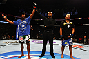 ATLANTA, GA - APRIL 21:  Marcus Brimage (L) celebrates after defeating Maximo Blanco (R) in their featherweight bout for UFC 145 at Philips Arena on April 21, 2012 in Atlanta, Georgia.  (Photo by Al Bello/Zuffa LLC/Zuffa LLC via Getty Images)