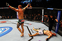 ATLANTA, GA - APRIL 21:  Travis Browne (L) celebrates after Chad Griggs (R) tapped out during their heavyweight bout for UFC 145 at Philips Arena on April 21, 2012 in Atlanta, Georgia.  (Photo by Al Bello/Zuffa LLC/Zuffa LLC via Getty Images)