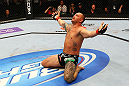 ATLANTA, GA - APRIL 21:  Travis Browne celebrates defeating Chad Griggs by tap out from an arm triangle during their heavyweight bout for UFC 145 at Philips Arena on April 21, 2012 in Atlanta, Georgia.  (Photo by Al Bello/Zuffa LLC/Zuffa LLC via Getty Images)
