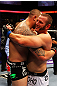 ATLANTA, GA - APRIL 21:  Travis Browne (L) embraces Chad Griggs after defeating him by tap out in their heavyweight bout for UFC 145 at Philips Arena on April 21, 2012 in Atlanta, Georgia.  (Photo by Al Bello/Zuffa LLC/Zuffa LLC via Getty Images)