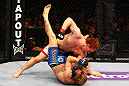 ATLANTA, GA - APRIL 21:  Mark Bocek (top) punches John Alessio during their lightweight bout for UFC 145 at Philips Arena on April 21, 2012 in Atlanta, Georgia.  (Photo by Al Bello/Zuffa LLC/Zuffa LLC via Getty Images)