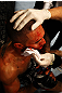 ATLANTA, GA - APRIL 21:  Che Mills recieves medical attention during his welterweight bout against Rory MacDonald for UFC 145 at Philips Arena on April 21, 2012 in Atlanta, Georgia.  (Photo by Al Bello/Zuffa LLC/Zuffa LLC via Getty Images)