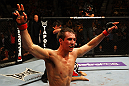 ATLANTA, GA - APRIL 21:  Rory MacDonald celebrates as he defeats Che Mills by TKO during their welterweight bout for UFC 145 at Philips Arena on April 21, 2012 in Atlanta, Georgia.  (Photo by Al Bello/Zuffa LLC/Zuffa LLC via Getty Images)